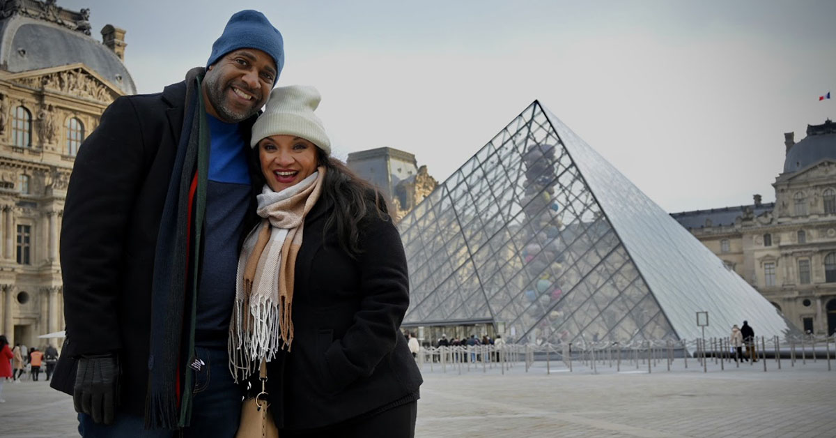 Zod and Drea in front of the Louvre in Paris